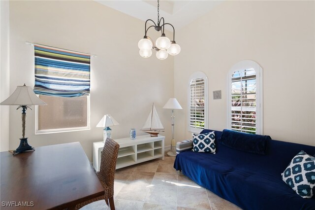 6492 Caldecott Dr, Naples, FL 34113 - tiled living room with a chandelier and a high ceiling