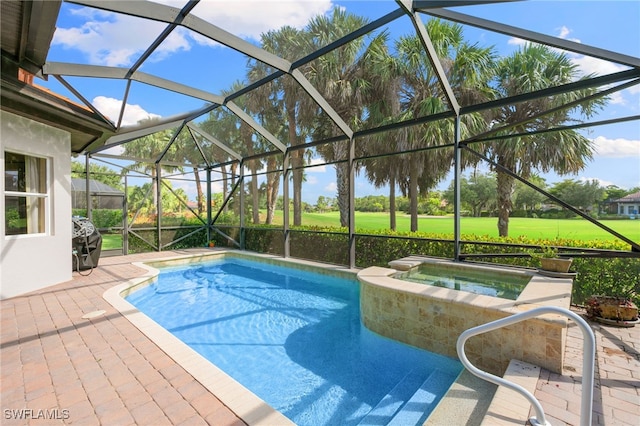 6492 Caldecott Dr, Naples, FL 34113 - view of swimming pool with glass enclosure, a pool with connected hot tub, and a patio