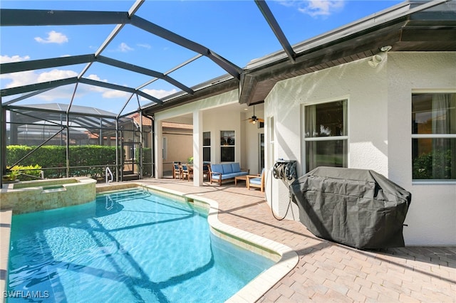 6492 Caldecott Dr, Naples, FL 34113 - view of swimming pool with a patio area, outdoor lounge area, ceiling fan, a pool with connected hot tub, and a lanai