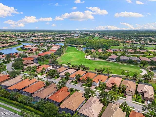 6492 Caldecott Dr, Naples, FL 34113 - aerial perspective of suburban area with a nearby body of water and a local golf course