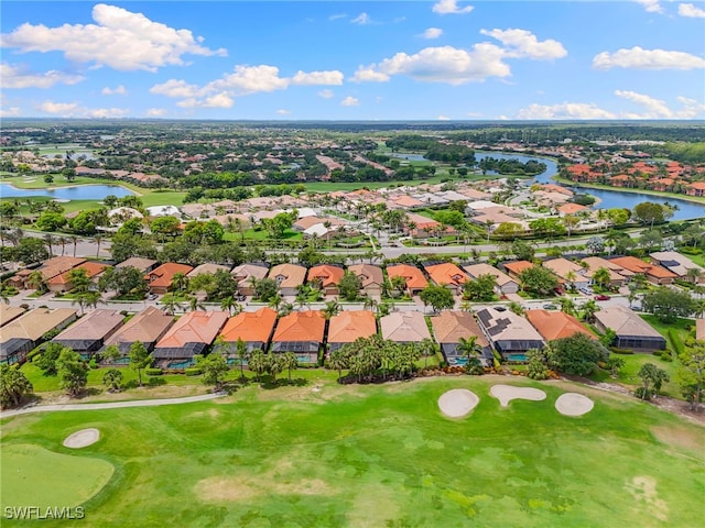 6492 Caldecott Dr, Naples, FL 34113 - aerial perspective of suburban area with a nearby body of water and a local golf course