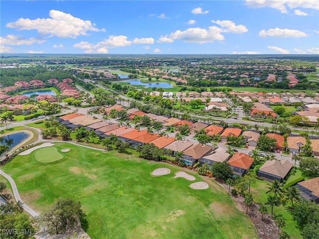 6492 Caldecott Dr, Naples, FL 34113 - aerial perspective of suburban area featuring a large body of water and a golf course