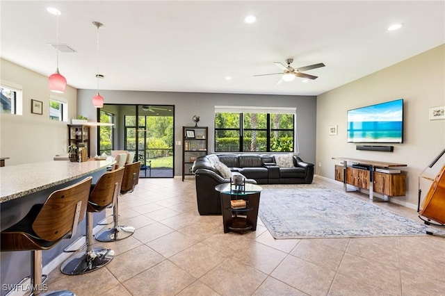 6624 Palmerston Dr, Fort Myers, FL 33966 - living room featuring a ceiling fan, recessed lighting, light tile patterned floors, and baseboards