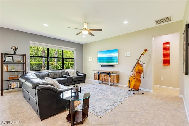 6624 Palmerston Dr, Fort Myers, FL 33966 - living room with ceiling fan, recessed lighting, light tile patterned flooring, and baseboards