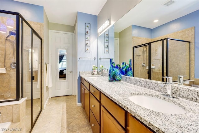 6624 Palmerston Dr, Fort Myers, FL 33966 - full bath with a shower stall, double vanity, and tile patterned flooring