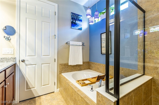 6624 Palmerston Dr, Fort Myers, FL 33966 - bathroom featuring vanity, a bath, tiled shower, and tile patterned floors