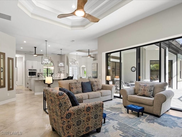 2360 19th St SW, Naples, FL 34117 - living area featuring a ceiling fan, light tile patterned flooring, a chandelier, recessed lighting, and ornamental molding