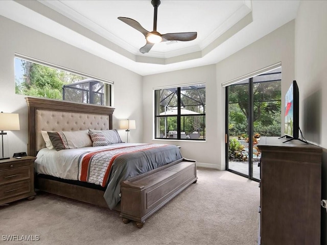 2360 19th St SW, Naples, FL 34117 - bedroom featuring access to exterior, light colored carpet, crown molding, a tray ceiling, and a ceiling fan