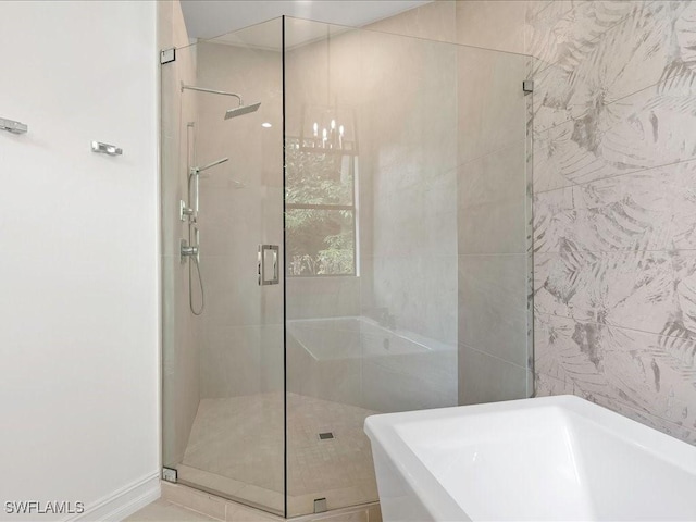 2360 19th St SW, Naples, FL 34117 - full bath with a freestanding bath and a stall shower