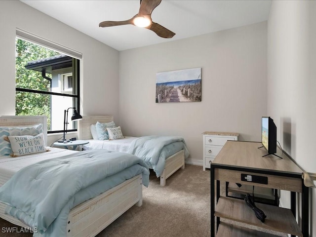 2360 19th St SW, Naples, FL 34117 - bedroom featuring light carpet, ceiling fan, and baseboards