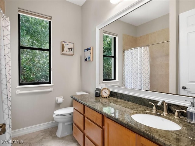 2360 19th St SW, Naples, FL 34117 - bathroom featuring plenty of natural light, vanity, toilet, and a shower with curtain