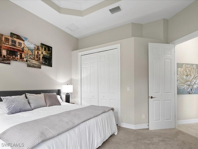 2360 19th St SW, Naples, FL 34117 - bedroom with light colored carpet, a closet, and baseboards