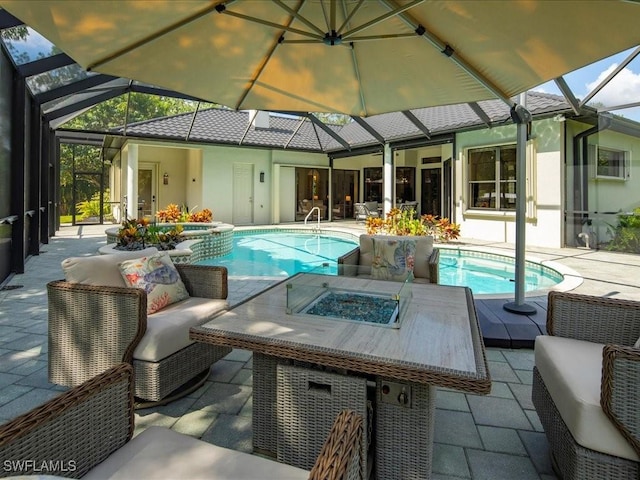 2360 19th St SW, Naples, FL 34117 - outdoor pool featuring an in-ground hot tub, glass enclosure, a patio, and an outdoor living space with a fire pit
