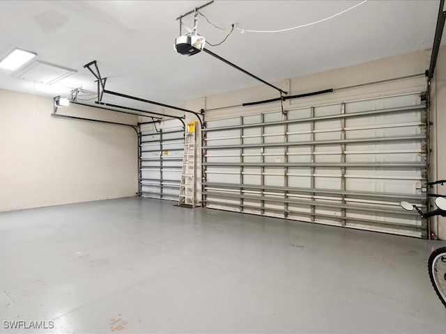 2360 19th St SW, Naples, FL 34117 - garage with a garage door opener