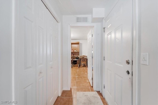 434 Leawood Cir, Naples, FL 34104 - hallway with light tile patterned flooring