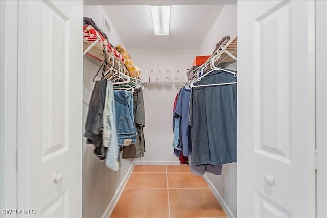 434 Leawood Cir, Naples, FL 34104 - spacious closet with tile patterned flooring