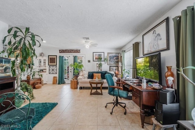 434 Leawood Cir, Naples, FL 34104 - tiled office with a textured ceiling, french doors, and a ceiling fan