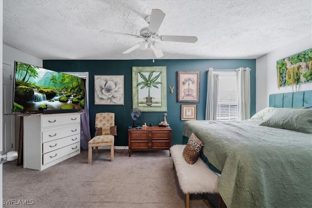 434 Leawood Cir, Naples, FL 34104 - carpeted bedroom featuring a textured ceiling and a ceiling fan