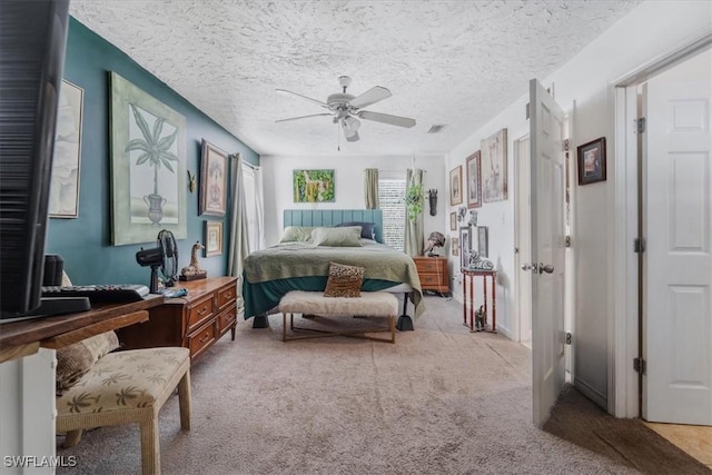 434 Leawood Cir, Naples, FL 34104 - bedroom featuring light carpet, ceiling fan, and a textured ceiling