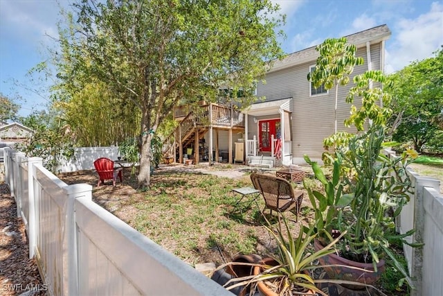 434 Leawood Cir, Naples, FL 34104 - fenced backyard with stairway and a deck