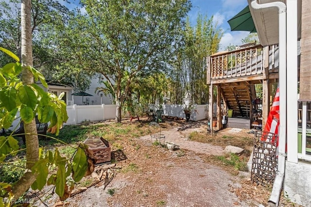 434 Leawood Cir, Naples, FL 34104 - fenced backyard featuring stairway and a deck