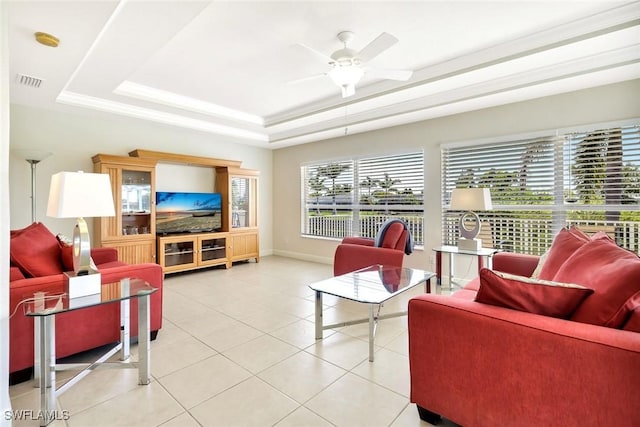 3317 SW 5th Pl, Cape Coral, FL 33914 - living room with a raised ceiling, ceiling fan, and light tile patterned floors