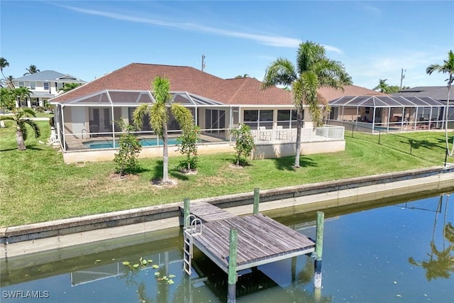 3317 SW 5th Pl, Cape Coral, FL 33914 - back of house featuring a water view, a lawn, an outdoor pool, and glass enclosure