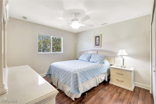 3317 SW 5th Pl, Cape Coral, FL 33914 - bedroom with dark wood-style flooring and ceiling fan