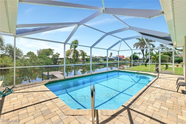 3317 SW 5th Pl, Cape Coral, FL 33914 - swimming pool with a patio area and a water view