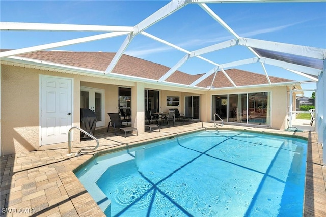 3317 SW 5th Pl, Cape Coral, FL 33914 - outdoor pool featuring a patio, a lanai, and french doors