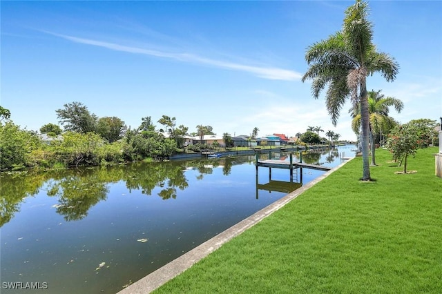 3317 SW 5th Pl, Cape Coral, FL 33914 - dock area featuring a yard and a water view