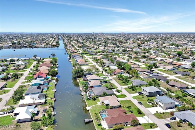 3317 SW 5th Pl, Cape Coral, FL 33914 - aerial perspective of suburban area with a large body of water