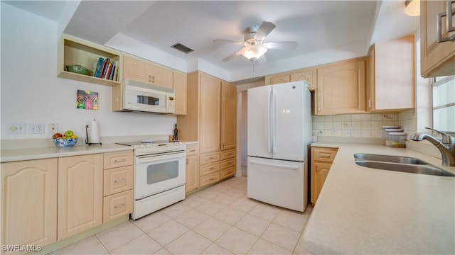 1682 S Flossmoor Rd, Fort Myers, FL 33919 - kitchen with white appliances, a sink, and light brown cabinets