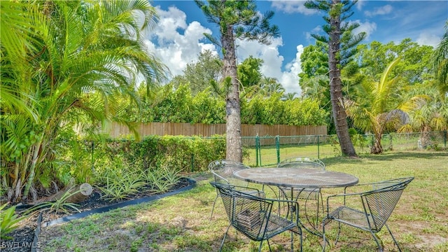 1682 S Flossmoor Rd, Fort Myers, FL 33919 - view of yard with outdoor dining space