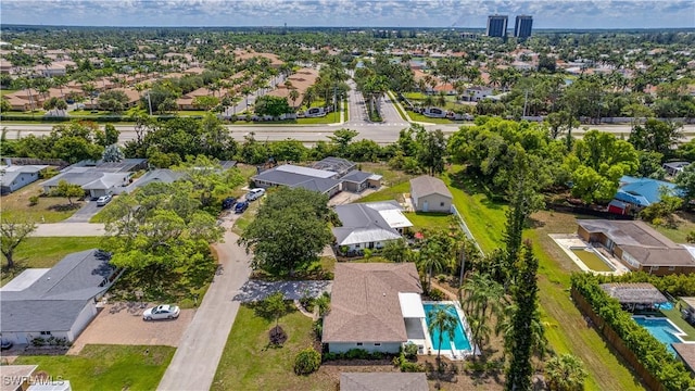 1682 S Flossmoor Rd, Fort Myers, FL 33919 - aerial view of residential area with a pool area