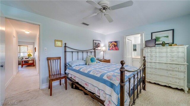 1682 S Flossmoor Rd, Fort Myers, FL 33919 - bedroom featuring light colored carpet, baseboards, connected bathroom, and ceiling fan