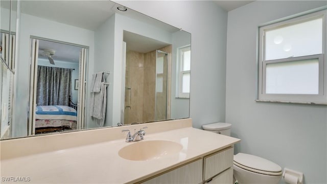 1682 S Flossmoor Rd, Fort Myers, FL 33919 - ensuite bathroom featuring toilet, vanity, and a shower