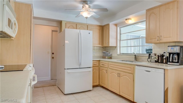 1682 S Flossmoor Rd, Fort Myers, FL 33919 - kitchen with white appliances, a sink, and light brown cabinetry