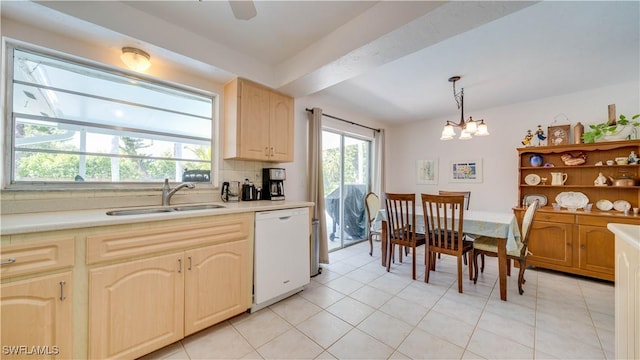 1682 S Flossmoor Rd, Fort Myers, FL 33919 - kitchen featuring dishwasher, a sink, light countertops, a chandelier, and decorative backsplash