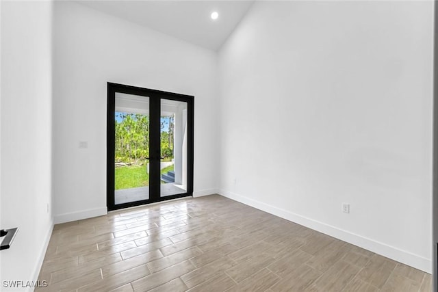 14074 Whittier Ln, Port Charlotte, FL 33981 - unfurnished room with light wood finished floors and recessed lighting