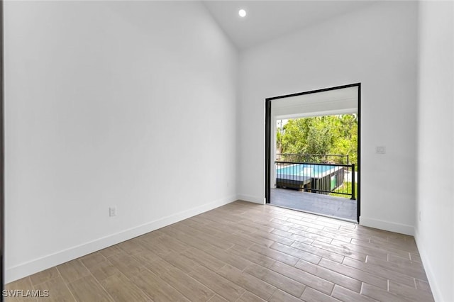 14074 Whittier Ln, Port Charlotte, FL 33981 - spare room with wood finished floors and recessed lighting