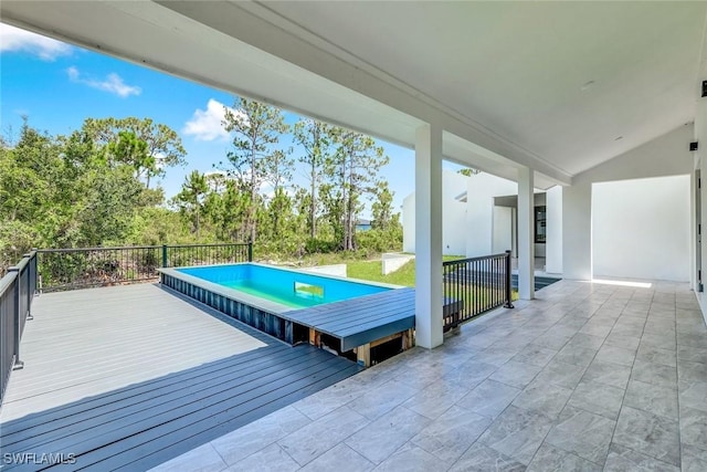 14074 Whittier Ln, Port Charlotte, FL 33981 - wooden terrace with a swimming pool