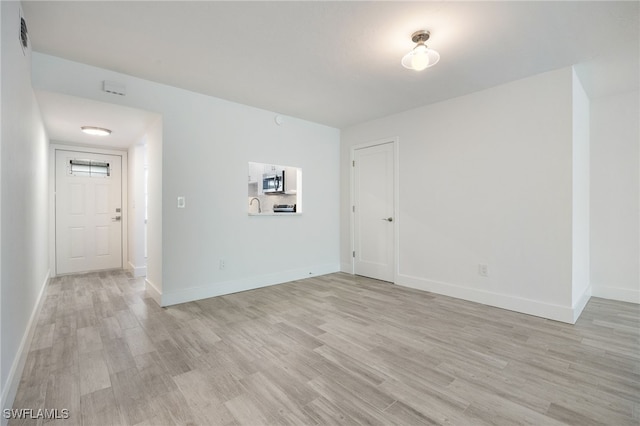 1830 Brantley Rd Unit A2, Fort Myers, FL 33907 - unfurnished room featuring light wood-type flooring and baseboards