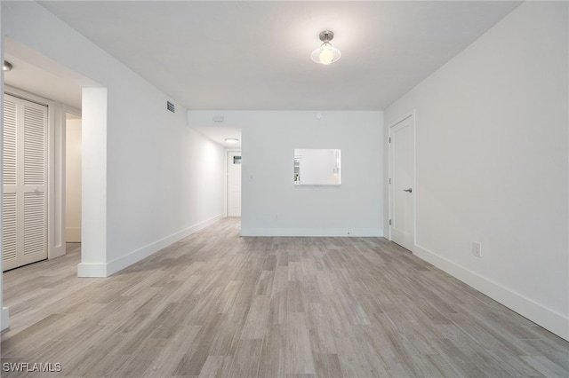 1830 Brantley Rd Unit A2, Fort Myers, FL 33907 - empty room with light wood-style flooring and baseboards