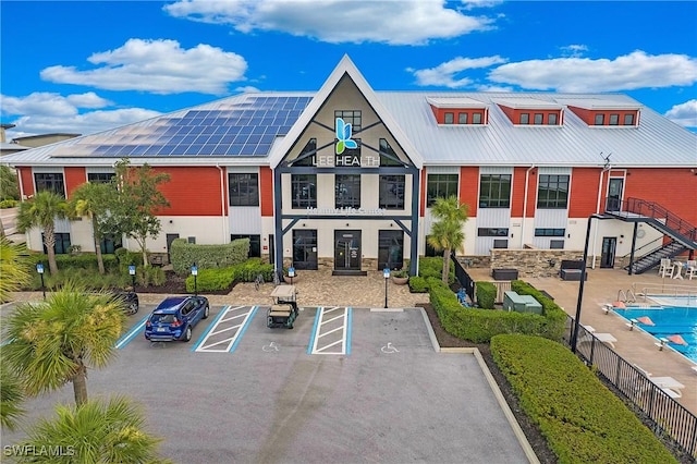 17811 Palmetto Pass Ln, Punta Gorda, FL 33982 - view of building exterior featuring uncovered parking