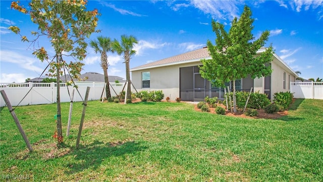 17811 Palmetto Pass Ln, Punta Gorda, FL 33982 - fenced backyard with a sunroom