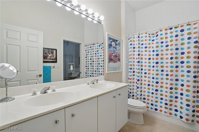 878 Vistana Cir Unit 50, Naples, FL 34119 - bathroom with tile patterned flooring, double vanity, toilet, and a shower with shower curtain