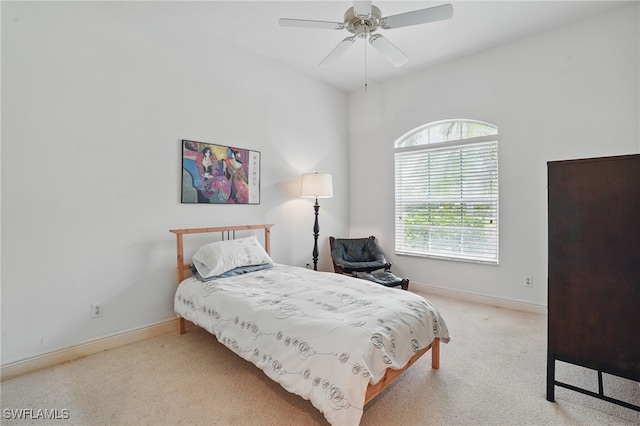 878 Vistana Cir Unit 50, Naples, FL 34119 - carpeted bedroom featuring baseboards and a ceiling fan