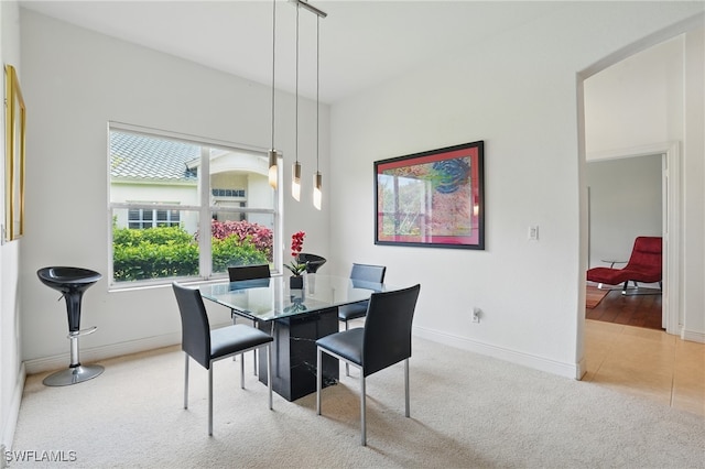 878 Vistana Cir Unit 50, Naples, FL 34119 - carpeted dining room featuring baseboards