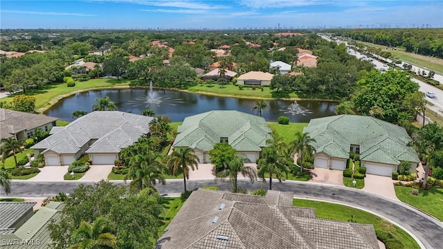 878 Vistana Cir Unit 50, Naples, FL 34119 - aerial perspective of suburban area featuring a large body of water